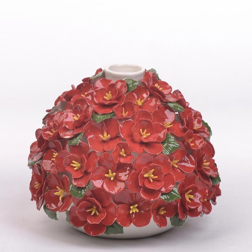 Glazed ceramic vases with sculpted red blossom clusters and green leaf accents (tall + low + round silhouettes).