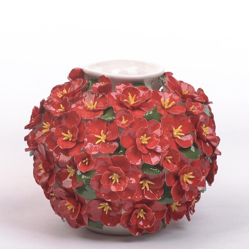 Glazed ceramic vases with sculpted red blossom clusters and green leaf accents (tall + low + round silhouettes).