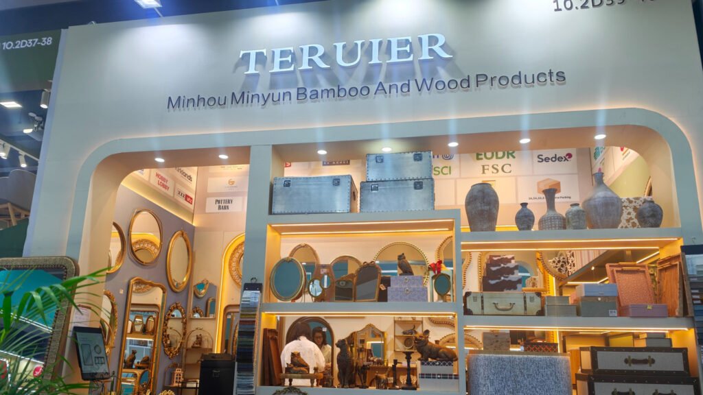 Teruier booth at the 2026 Autumn Canton Fair showing decorative mirrors, accent furniture and home decor displays.