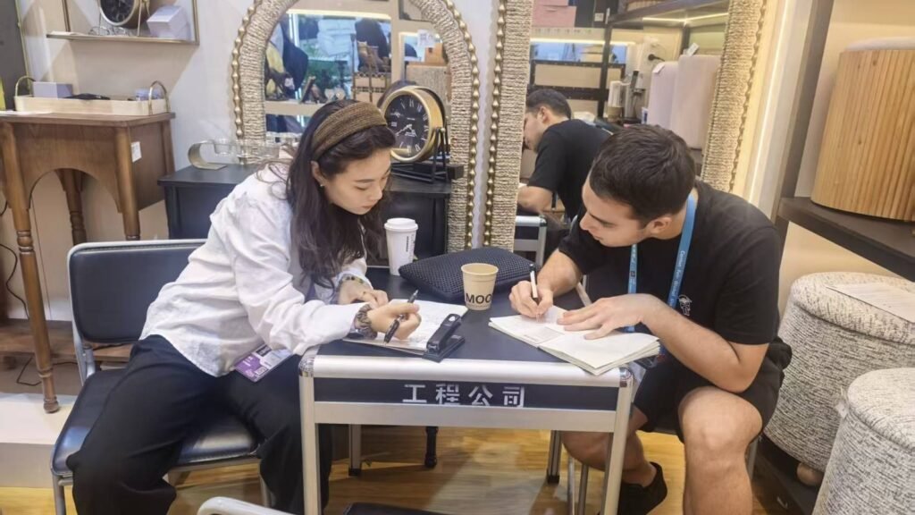 Trade show visitors exploring decorative mirrors and home accessories at the Teruier Canton Fair 2026 booth.