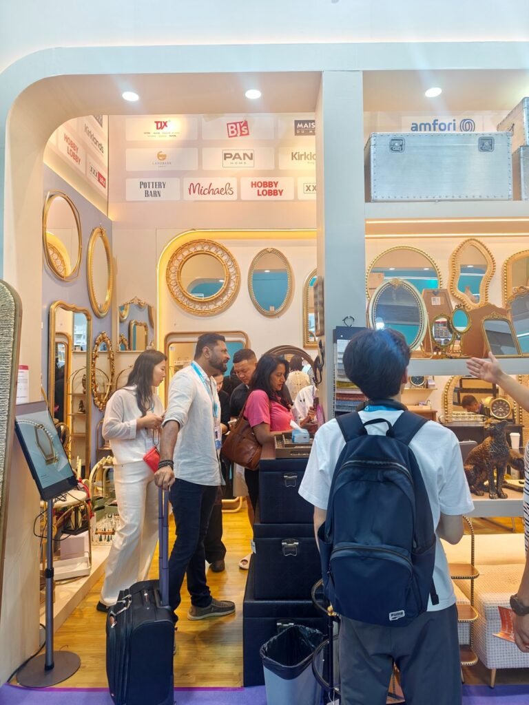 Trade show visitors exploring decorative mirrors and home accessories at the Teruier Canton Fair 2026 booth.